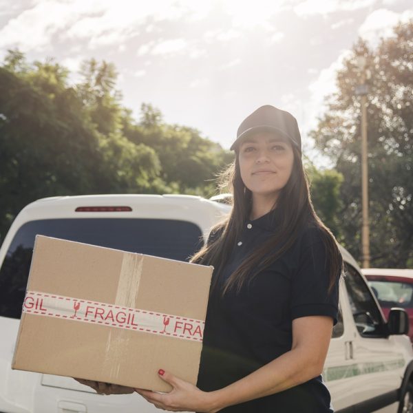 portrait-female-courier-with-parcel